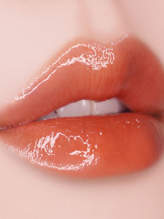 UNLEASHIA Popcorn Syrup Lip Plumper No.2 Mango Caramel Блеск - плампер для губ 3.8 gr - DYBEAUTY
