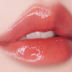 UNLEASHIA Popcorn Syrup Lip Plumper No.4 Honey Grapefruit Блеск - плампер для губ 3.8 gr - DYBEAUTY
